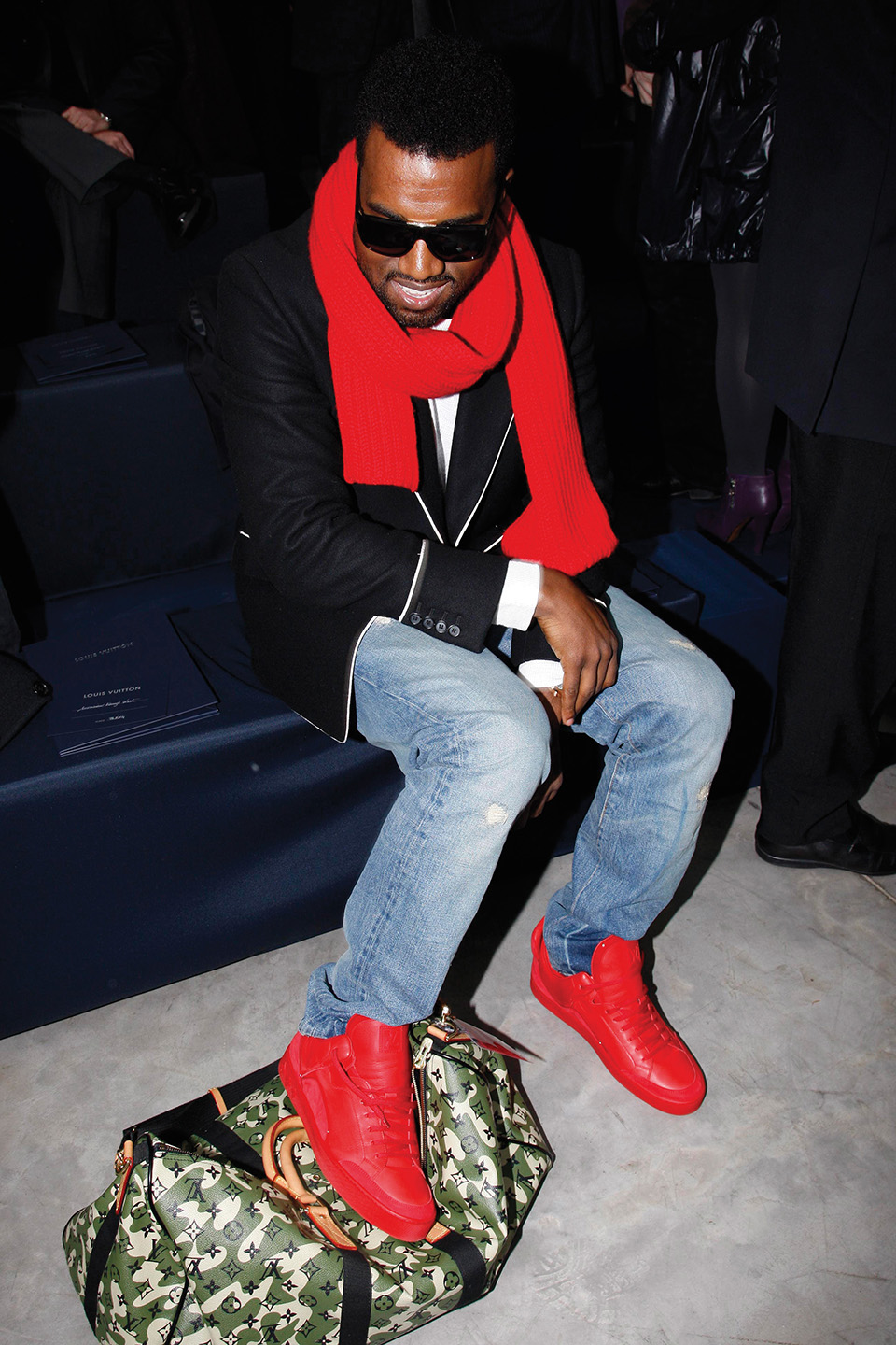 Kanye West in selbst kreierten Turnschuhen für Louis Vuitton während der Louis Vuitton Herbst/Winter 2019 Show in Paris.